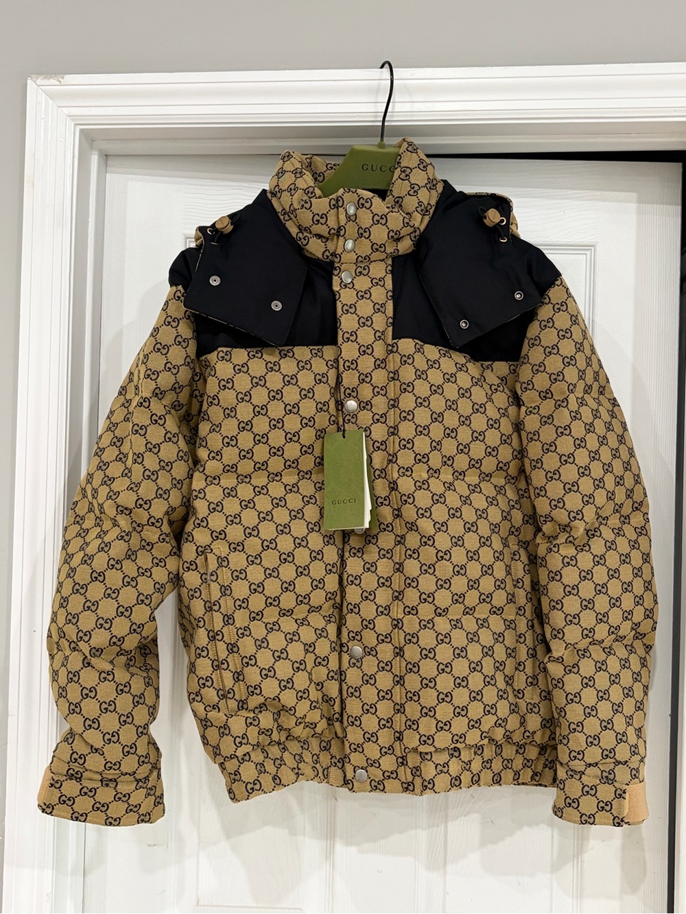Gucci all-over logo print puffer coat